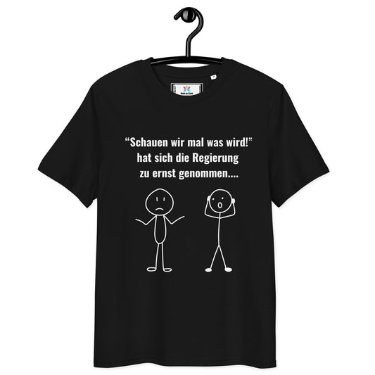 Schwarzes T-Shirt mit weißem Text: „Schauen wir mal was wird! hat sich die Regierung zu ernst genommen....“ und zwei Strichmännchen